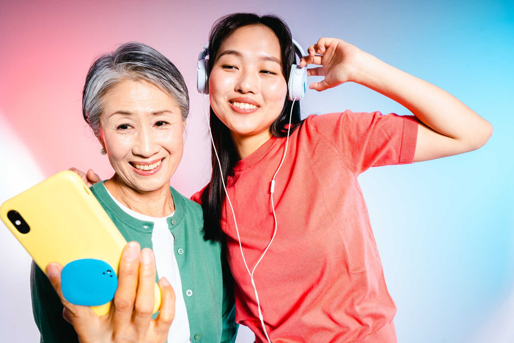 High Flash Casual Tech Older and Younger Women with Gadgets